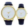 Gold and black pair watch